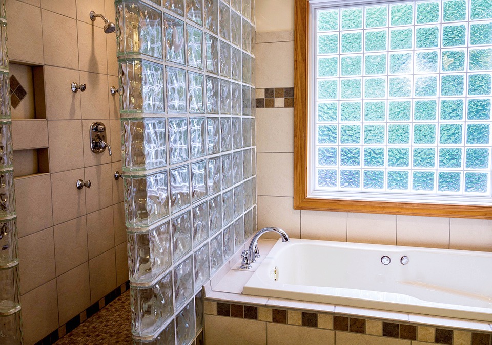 Bathroom with glass block window and glass block window wallafter replacement